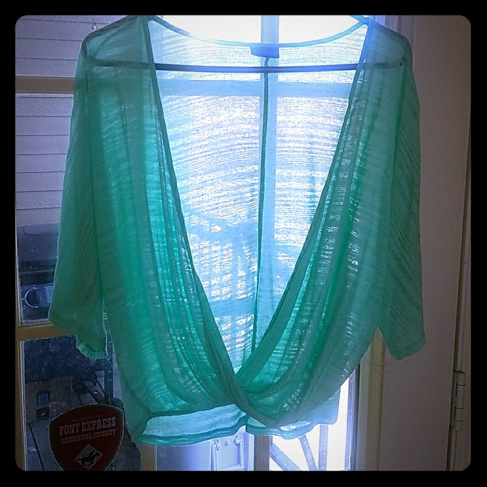 Seafoam green light over shirt